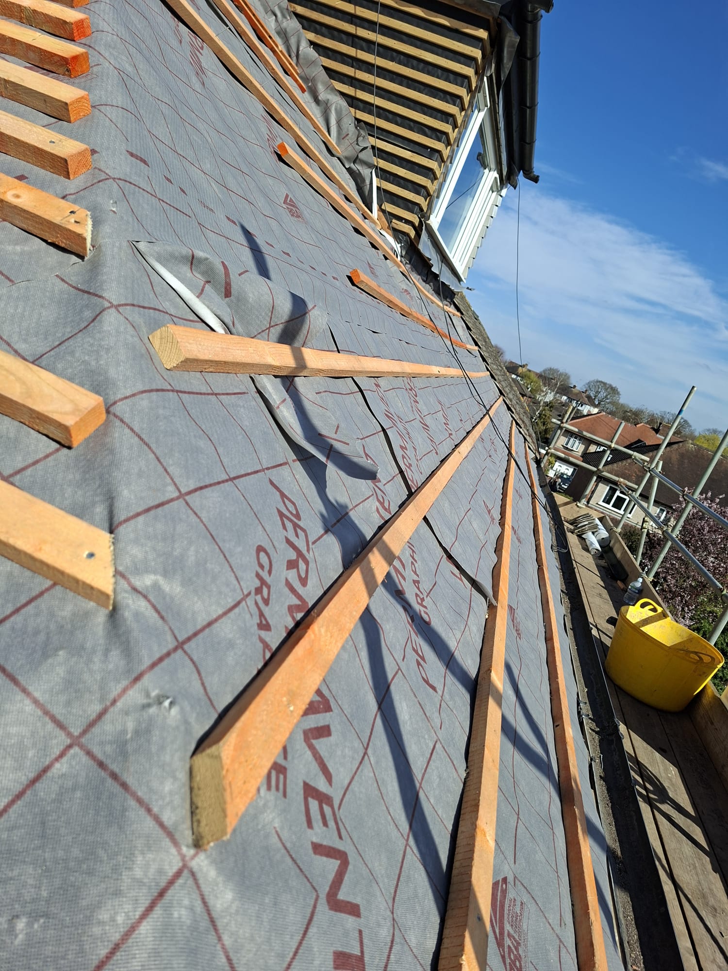 Breathable membrane and counter battens on residential roof replacement