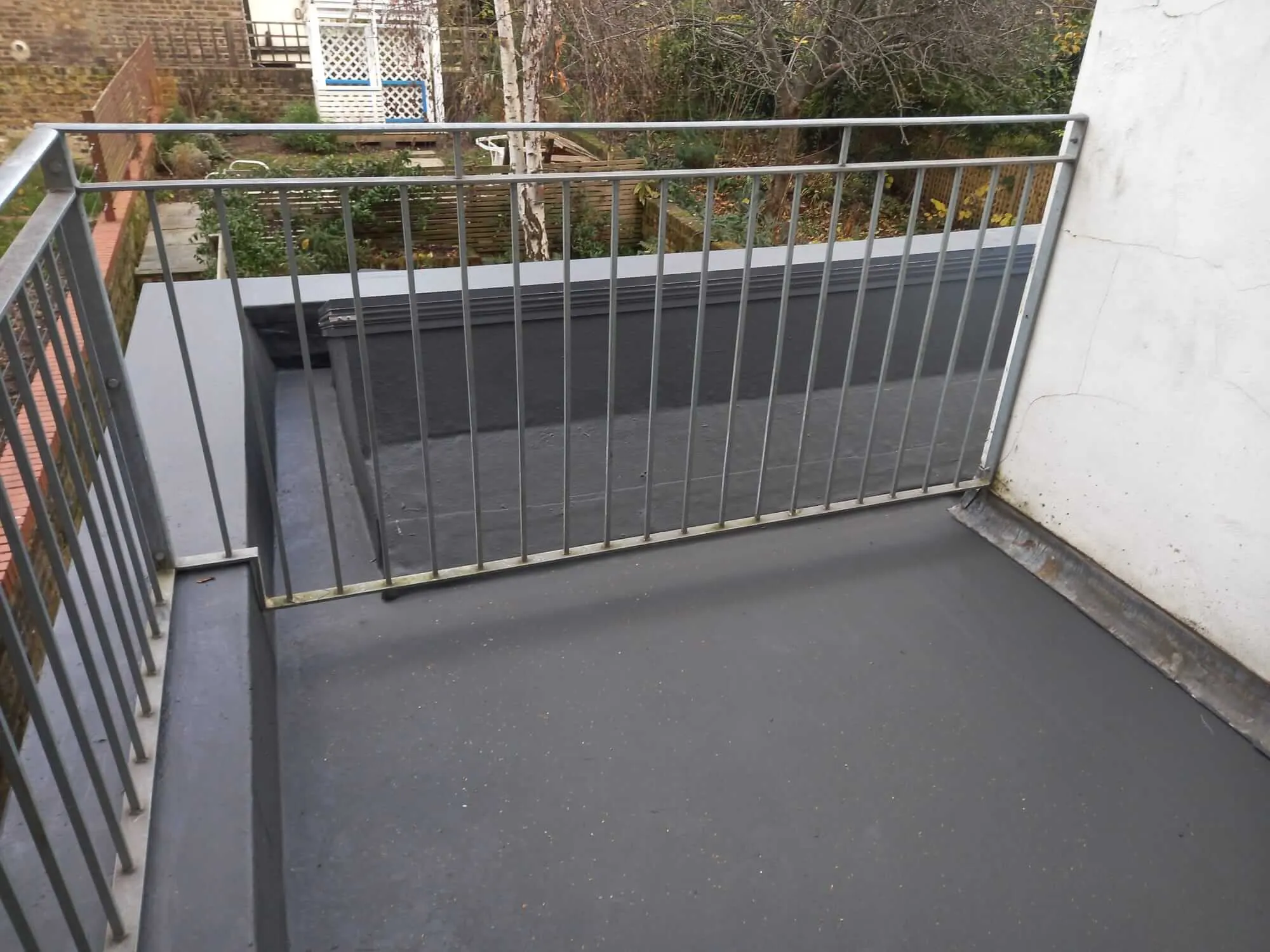 EPDM rubber flat roof on balcony with anti-slip finish in London
